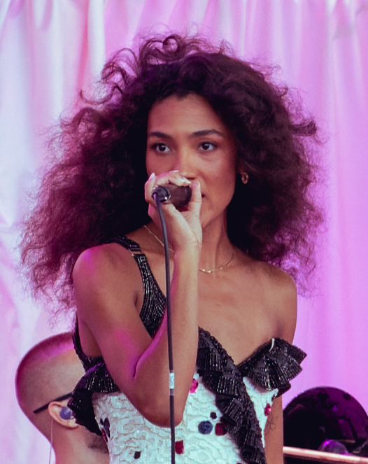 Olivia Dean performing live in concert during 2027 Tour